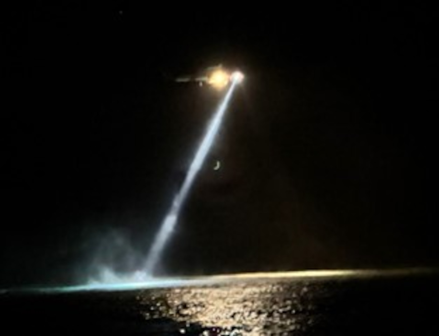 A Coast Guard MH-60T Jayhawk helicopter aircrew searches for a missing swimmer, Brandon Smith, off Flamenco Beach in Culebra, Puerto Rico, Dec 18, 2024.  Coast Guard and multiple local emergency response agencies continue search efforts, Dec. 19, 2024, for Brandon Smith, U.S. citizen residing in Culebra, Puerto Rico. (Courtesy photo)