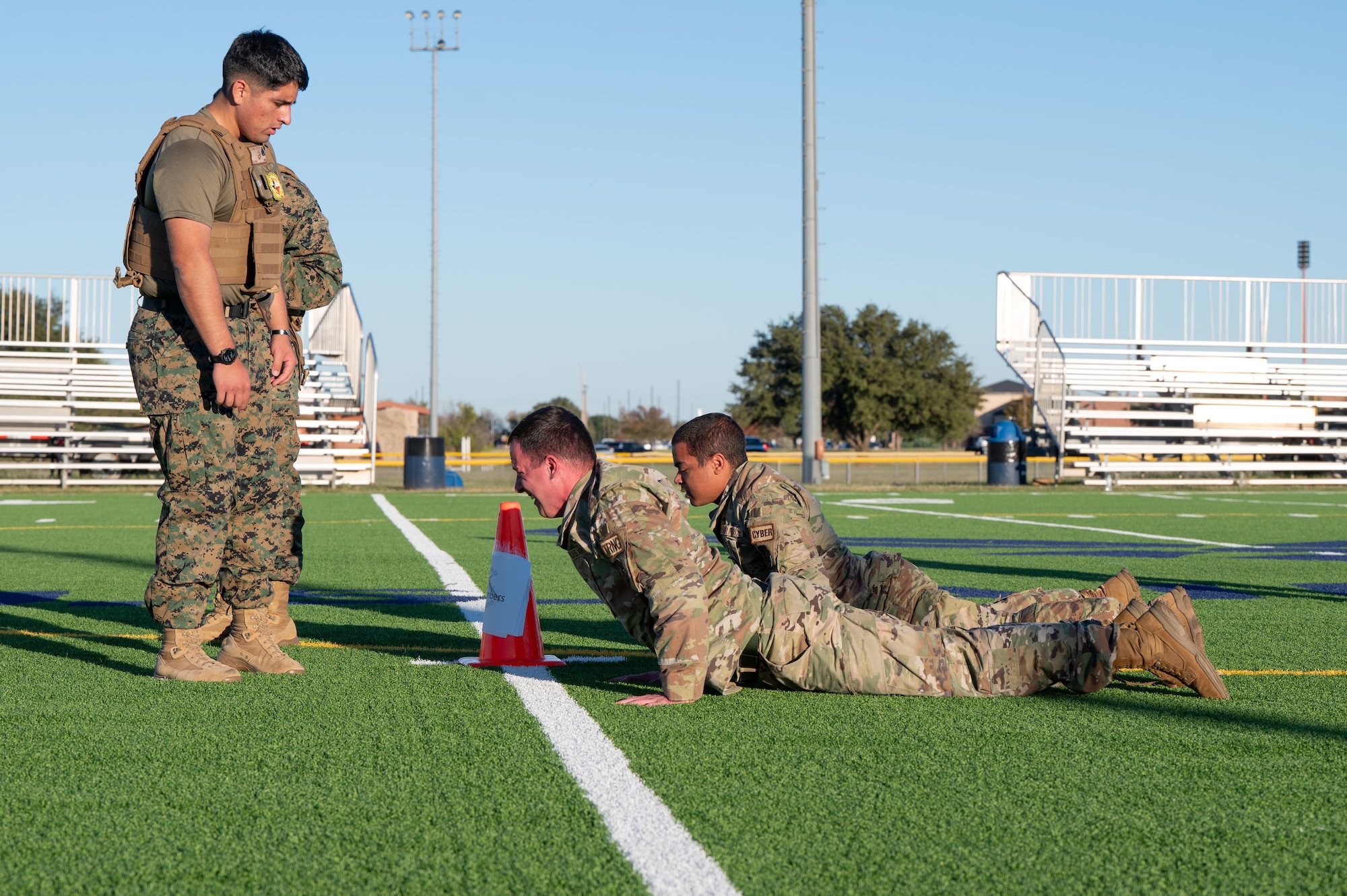 U.S. Air Force Airmen complete Marine Corps Martial Arts Program exercises at Dyess Air Force Base, Texas, Nov. 21, 2024. Joint training fosters a camaraderie and mutual understanding between branches, leading to better integration and operations during missions. (U.S. Air Force photo by Airman 1st Class Emma Anderson)
