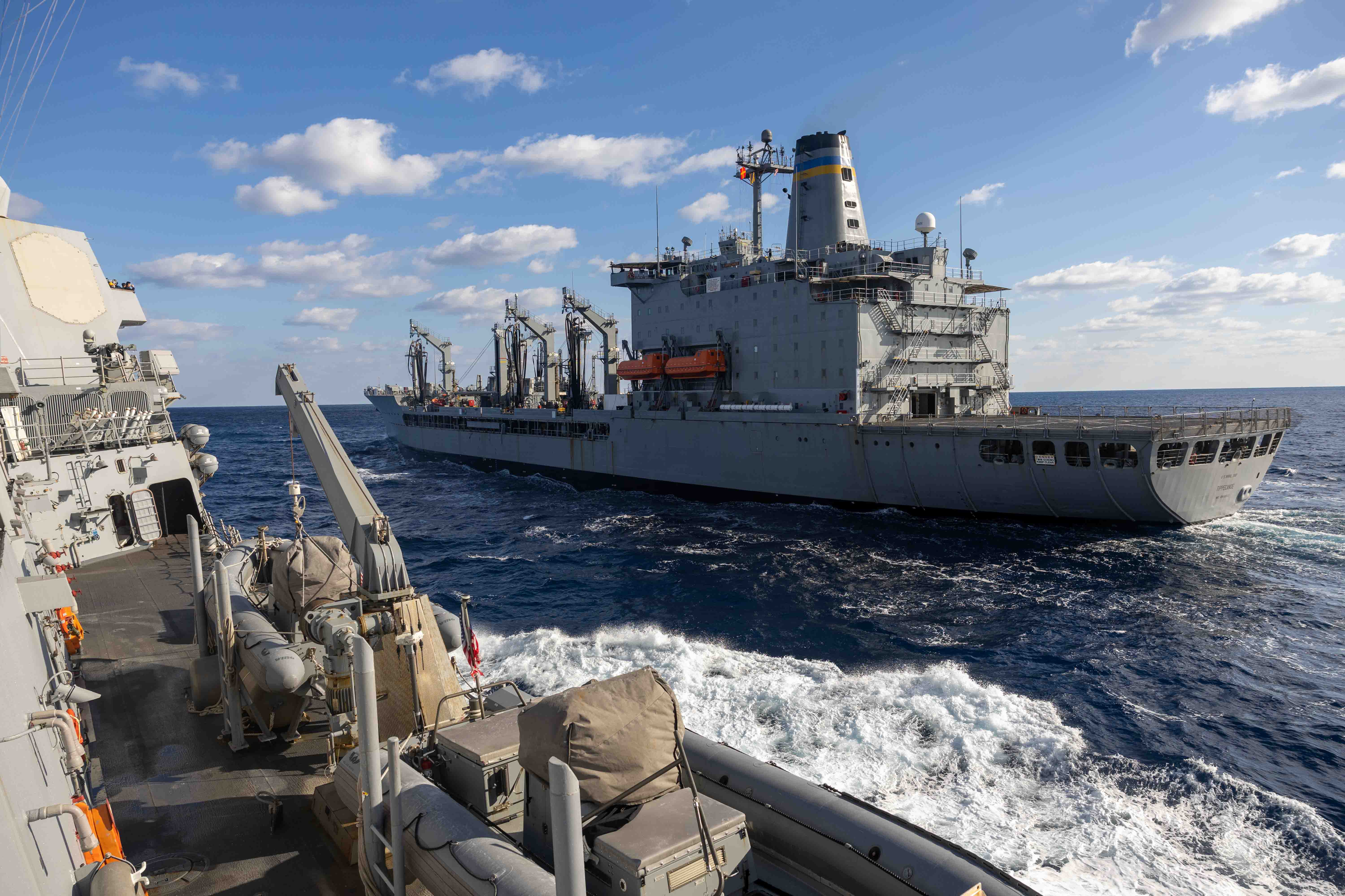 he Arleigh Burke-class guided-missile destroyer USS Preble (DDG 88) approaches the Henry J. Kaiser-class fleet replenishment oiler USNS Tippecanoe (T-AO 199) for a replenishment at sea in the Philippine Sea, Dec. 10. Commander, Task Force 73 (CTF-73) in coordination with Military Sealift Command Far East (MSC FE) refuels and resupplies deployed naval forces, along with regional allies and partners in the Indo-Pacific. Preble is forward-deployed and assigned to Destroyer Squadron (DESRON) 15, the Navy's largest DESRON and the U.S. 7th Fleet's principal surface force.