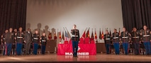 U.S. Marine Corps Sgt. Kaise Wagner, vocalist with Marine Band San Diego, Headquarters and Service Battalion, Marine Corps Recruit Depot San Diego, sings the national anthem prior to the Basic Recruiter’s Course 1-25 graduation at Marine Corps Recruit Depot San Diego, California, Dec. 13, 2024. The mission of the BRC is to provide staff noncommissioned officers and noncommissioned officers the basic skills and knowledge in order to successfully inform young men and women about the opportunities and career paths the Marine Corps has to offer. (U.S. Marine Corps photo by Lance Cpl. Janell B. Alvarez)