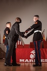 Retired U.S. Marine Corps Master Gunnery Sgt. William Barr, the guest of honor, presents the graduation certificates during the Basic Recruiter’s Course 1-25 graduation at Marine Corps Recruit Depot San Diego, California, Dec. 13, 2024. The mission of the BRC is to provide staff noncommissioned officers and noncommissioned officers the basic skills and knowledge in order to successfully inform young men and women about the opportunities and career paths the Marine Corps has to offer. (U.S. Marine Corps photo by Lance Cpl. Janell B. Alvarez)