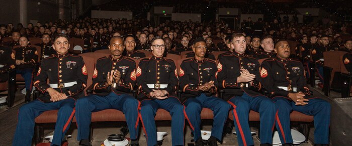 U.S. Marines with Marine Corps Recruiting Command view the Basic Recruiter’s Course 1-25 graduation at Marine Corps Recruit Depot San Diego, California, Dec. 13, 2024. The mission of the BRC is to provide staff noncommissioned officers and noncommissioned officers the basic skills and knowledge in order to successfully inform young men and women about the opportunities and career paths the Marine Corps has to offer. (U.S. Marine Corps photo by Lance Cpl. Janell B. Alvarez)