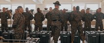U.S. Marine Corps Company Commander, Capt. Brandon Carter, right, and Senior Drill Instructor, Staff Sgt. Riley Cotton, both with Fox Company, 2nd Recruit Training Battalion, conduct a company commander’s inspection at Marine Corps Recruit Depot San Diego, California, Dec. 14, 2024. The company commander’s inspection surveys new Marines for knowledge, bearing, and attention to detail before the battalion commander’s inspection, one of their last tests before graduating. (U.S. Marine Corps photo by Lance Cpl. Janell B. Alvarez)