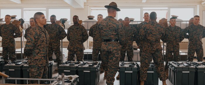 U.S. Marine Corps Company Commander, Capt. Brandon Carter, right, and Senior Drill Instructor, Staff Sgt. Riley Cotton, both with Fox Company, 2nd Recruit Training Battalion, conduct a company commander’s inspection at Marine Corps Recruit Depot San Diego, California, Dec. 14, 2024. The company commander’s inspection surveys new Marines for knowledge, bearing, and attention to detail before the battalion commander’s inspection, one of their last tests before graduating. (U.S. Marine Corps photo by Lance Cpl. Janell B. Alvarez)