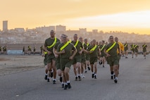 U.S. Marine Corps recruits with Echo Company, 2nd Recruit Training Battalion, execute the three-mile run portion of a physical fitness test at Marine Corps Recruit Depot San Diego, California, Dec. 16, 2024. The PFT is an evaluation that all recruits must pass and sets the standards all Marines must maintain once a year to assess battle readiness as well as physical conditioning. The Marine Corps is a professional, disciplined, and capable force. Honor, courage, and commitment are seen and felt in the shared experiences, hardships and challenges we face together in training, and in combat. These values embody what it is to be a Marine, and they live in the collective soul of our Corps. (U.S. Marine Corps photo by Lance Cpl. Janell B. Alvarez)