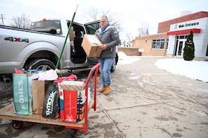 Many unloading box from truck