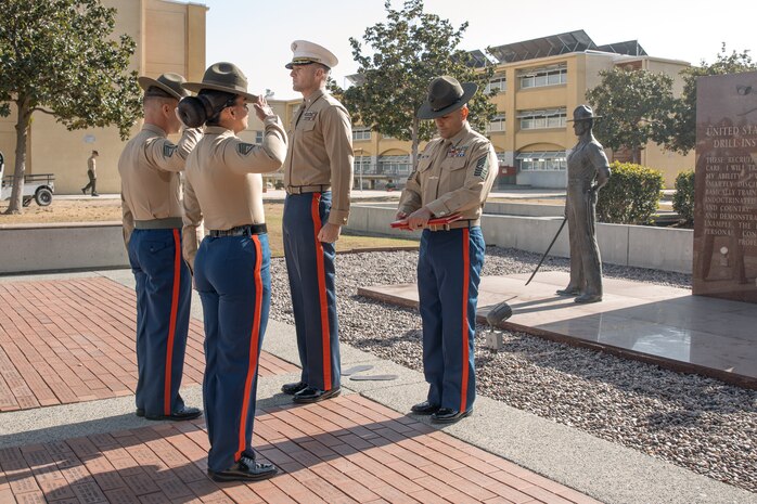 U.S. Marine Corps Drill Instructors, Staff Sgt. Burruel Delacruz, front left, and Staff Sgt. Barry Clayton, back left, both with Charlie Company, 1st Recruit Training Battalion, are presented a Navy and Marine Corps Achievement Medal at Marine Corps Recruit Depot San Diego, California, Dec. 13, 2024. A NAM is given to members of the U.S. Navy and Marine Corps for meritorious service or achievement. Delacruz and Clayton received a NAM for exemplifying unrivaled courage and extraordinary presence of mind when confronting a life-threatening emergency. The words “drill instructor, drill instructor, drill instructor” were called and Delacruz and Clayton sprang into action to save a fourteen-month-old infant who was unconscious and not breathing. Providing CPR and proper throat sweeping techniques they successfully dislodged the obstruction and the infant regained consciousness. Likely saving baby Aisla’s life.  The family of the infant was onsite during the ceremony and presented the awards. The Marine Corps has served the Nation honorably for 250 years. Marines embody the uncompromising standards and characteristics of honor, courage and commitment.