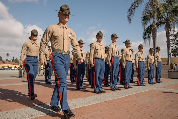 U.S. Marine Corps Drill Instructors, Staff Sgt. Burruel Delacruz, back left, and Staff Sgt. Barry Clayton, front left, both with Charlie Company, 1st Recruit Training Battalion, are presented a Navy and Marine Corps Achievement Medal at Marine Corps Recruit Depot San Diego, California, Dec. 13, 2024. A NAM is given to members of the U.S. Navy and Marine Corps for meritorious service or achievement. Delacruz and Clayton received a NAM for exemplifying unrivaled courage and extraordinary presence of mind when confronting a life-threatening emergency. The words “drill instructor, drill instructor, drill instructor” were called and Delacruz and Clayton sprang into action to save a fourteen-month-old infant who was unconscious and not breathing. Providing CPR and proper throat sweeping techniques they successfully dislodged the obstruction and the infant regained consciousness. Likely saving baby Aisla’s life.  The family of the infant was onsite during the ceremony and presented the awards. The Marine Corps has served the Nation honorably for 250 years. Marines embody the uncompromising standards and characteristics of honor, courage and commitment.