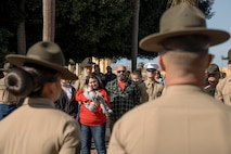 The family of baby Aisla observes U.S. Marine Corps Drill Instructors, Staff Sgt. Burruel Delacruz, front left, and Staff Sgt. Barry Clayton, back left, both with Charlie Company, 1st Recruit Training Battalion, are presented a Navy and Marine Corps Achievement Medal at Marine Corps Recruit Depot San Diego, California, Dec. 13, 2024. A NAM is given to members of the U.S. Navy and Marine Corps for meritorious service or achievement. Delacruz and Clayton received a NAM for exemplifying unrivaled courage and extraordinary presence of mind when confronting a life-threatening emergency. The words “drill instructor, drill instructor, drill instructor” were called and Delacruz and Clayton sprang into action to save a fourteen-month-old infant who was unconscious and not breathing. Providing CPR and proper throat sweeping techniques they successfully dislodged the obstruction and the infant regained consciousness. Likely saving baby Aisla’s life.  The family of the infant was onsite during the ceremony and presented the awards. The Marine Corps has served the Nation honorably for 250 years. Marines embody the uncompromising standards and characteristics of honor, courage and commitment.
