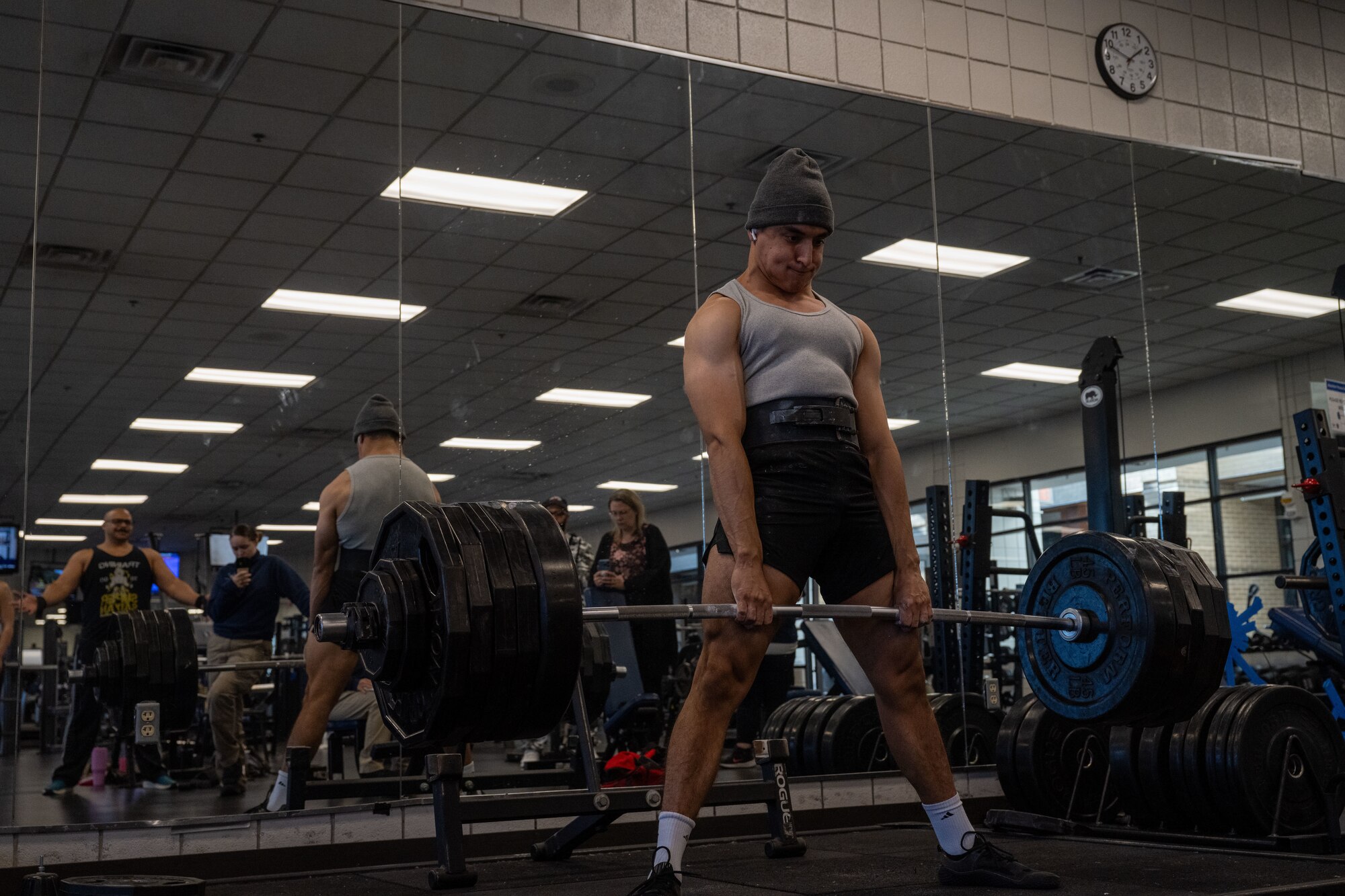 Airman 1st Class Jesus Velasco-Contreras, 22nd Force Support Squadron services apprentice, performs a deadlift during a base weightlifting competition Dec. 11, 2024, at McConnell Air Force Base, Kansas. Velasco-Contreras successfully performed a 525-pound deadlift during the competition. (U.S. Air Force photo by Airman 1st Class Paula Arce)