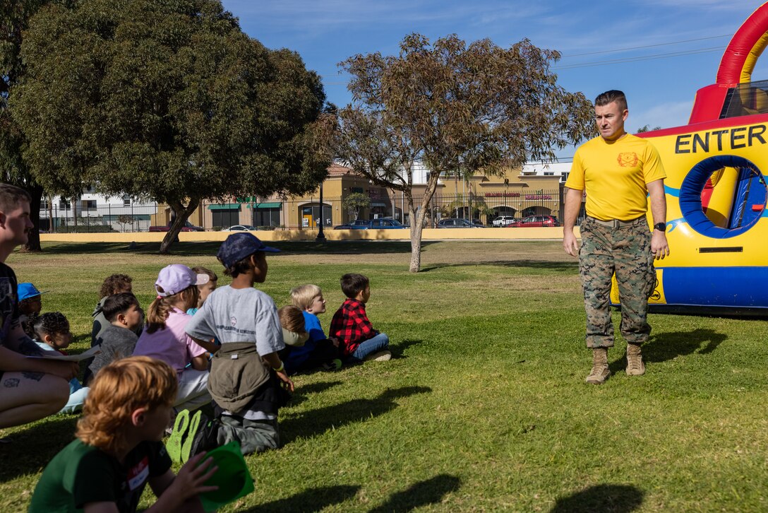 U.S. Marine Corps Company Commander, Capt. Isaac Liston, with Hotel Company, 2nd Recruit Training Battalion, participates in a Devil Pups event at Marine Corps Recruit Depot San Diego, California, Dec. 14, 2024. The Devil Pups event is a fun day in order to allow participants, aged five to twelve-years-old, to learn about Marine Corps culture, history, and traditions. This program is also a part of the Lifestyle, Insight, Network, Knowledge, and Skills Program, an interactive acculturation program to the Marine Corps lifestyle. (U.S. Marine Corps photo by Lance Cpl. Jacob B. Hutchinson)