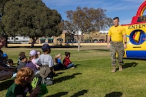 U.S. Marine Corps Company Commander, Capt. Isaac Liston, with Hotel Company, 2nd Recruit Training Battalion, participates in a Devil Pups event at Marine Corps Recruit Depot San Diego, California, Dec. 14, 2024. The Devil Pups event is a fun day in order to allow participants, aged five to twelve-years-old, to learn about Marine Corps culture, history, and traditions. This program is also a part of the Lifestyle, Insight, Network, Knowledge, and Skills Program, an interactive acculturation program to the Marine Corps lifestyle. (U.S. Marine Corps photo by Lance Cpl. Jacob B. Hutchinson)