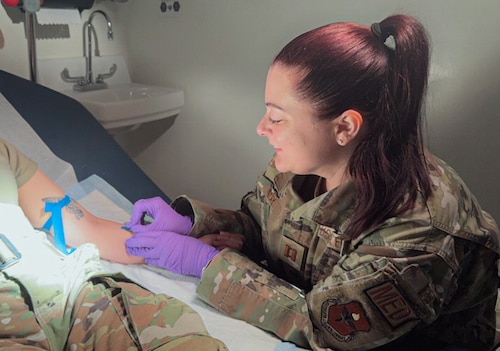 U.S. Air Force Capt. Jessica Casey, 42nd Medical Group registered nurse, administers IV on a patient at Maxwell Air Force Base, Alabama, Dec.19, 2024.