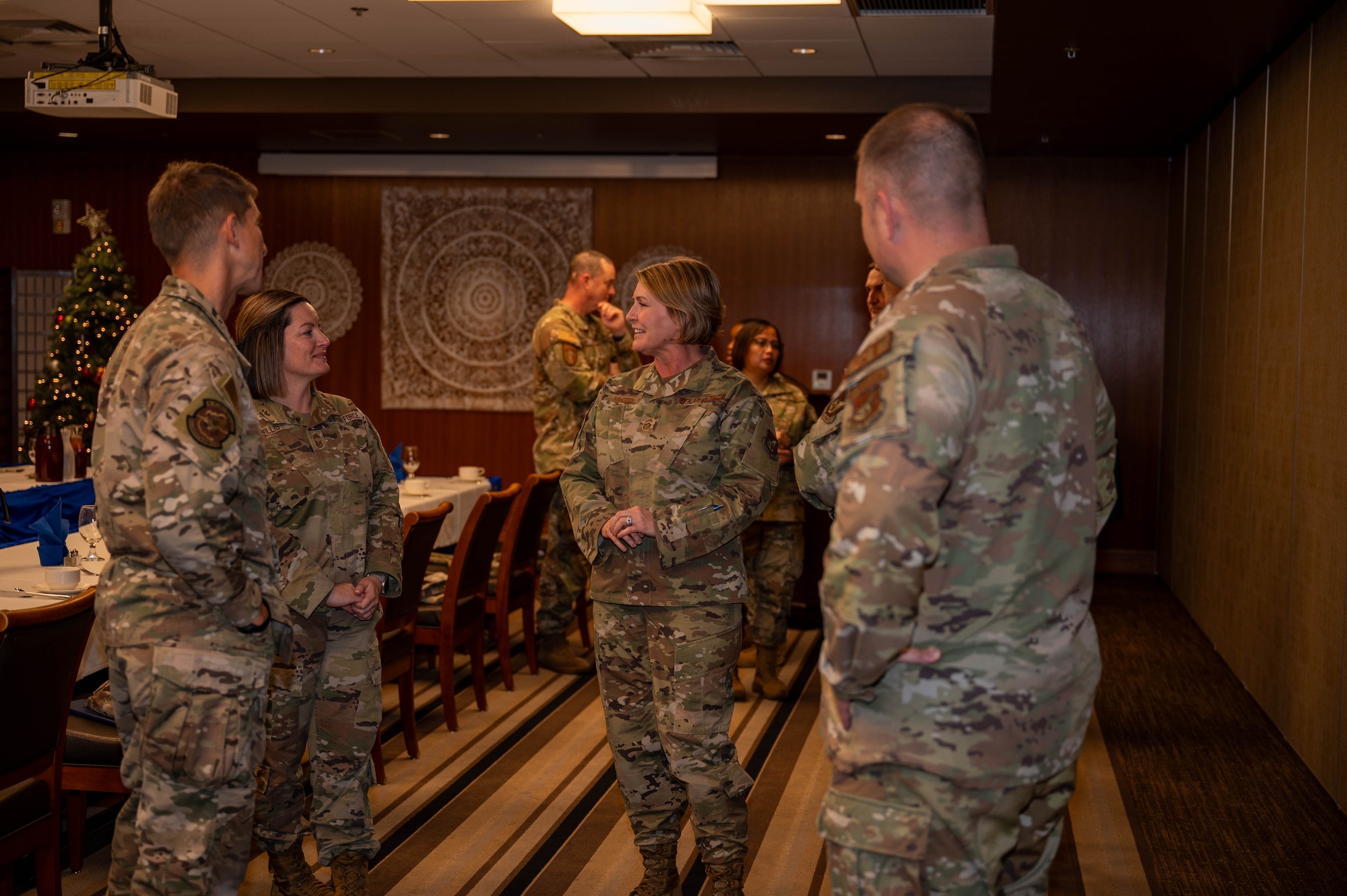 Service members speak together.