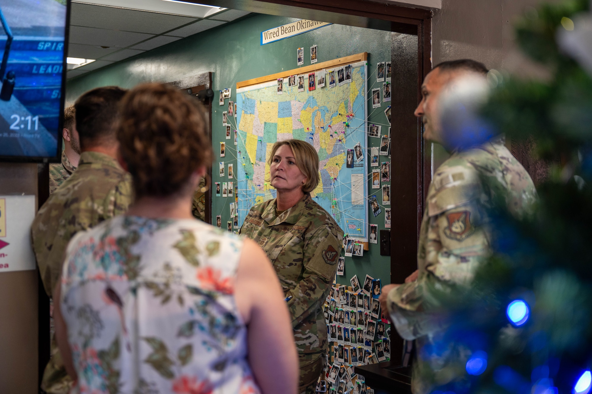 Service members speak together.