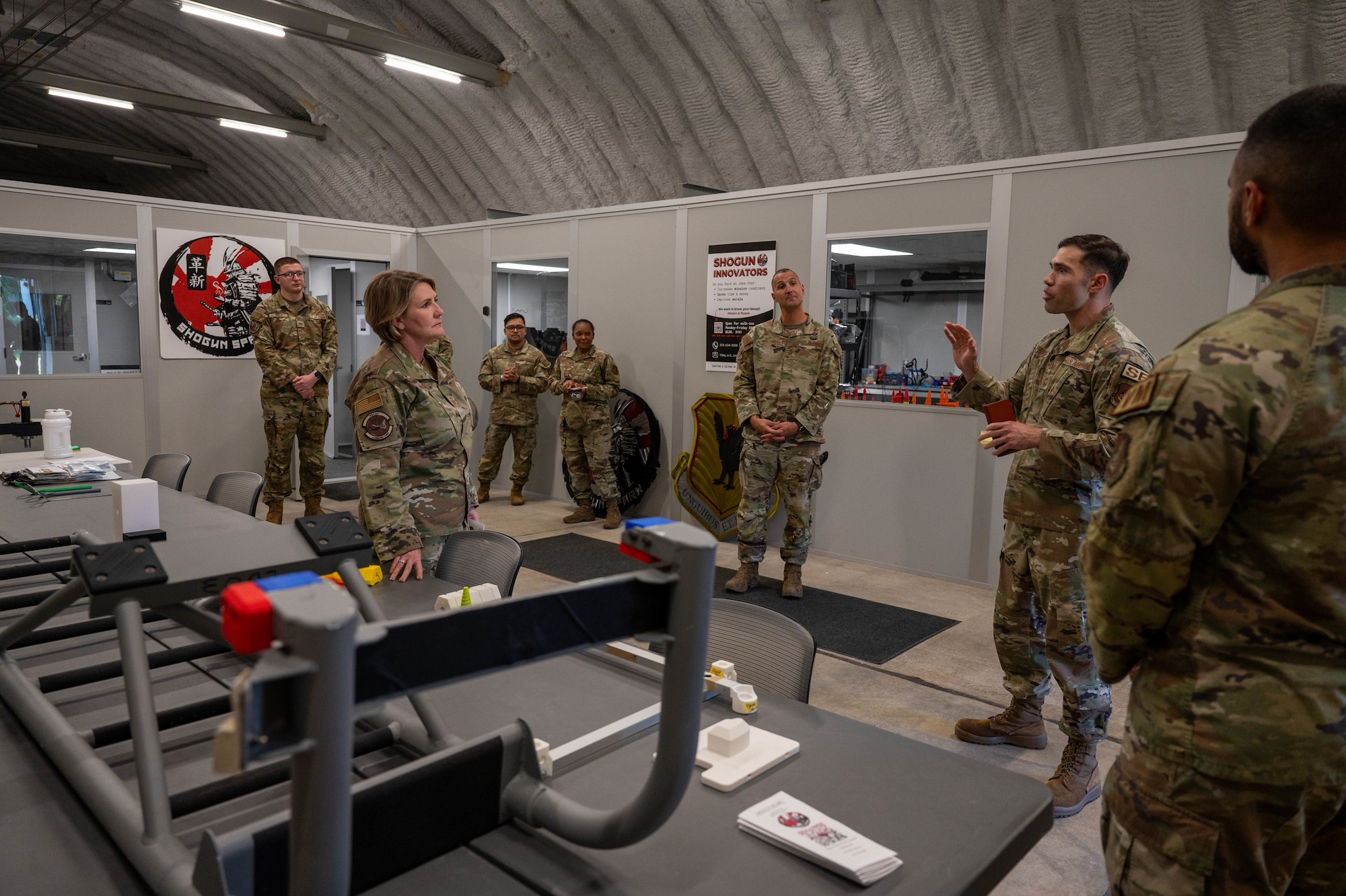 Service members speak together.