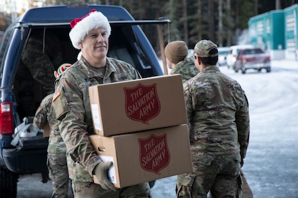 Approximately 50 Alaska National Guard service members, volunteers from the Salvation Army, AKNG Child and Youth Program and others visited the southeastern Alaskan city of Yakutat, Dec. 18, 2024.