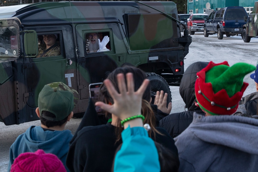 Approximately 50 Alaska National Guard service members, volunteers from the Salvation Army, AKNG Child and Youth Program and others visited the southeastern Alaskan city of Yakutat, Dec. 18, 2024.