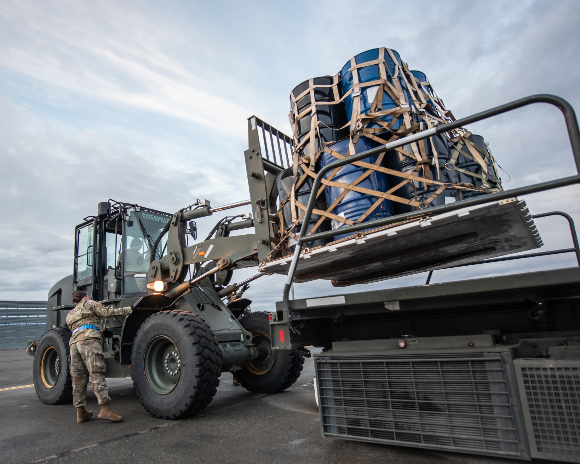 Members of the 123rd Airlift Wing upload cargo to a Kentucky Air National Guard C-130J Super Hercules aircraft in support of Operation Arctic Haven at Joint Base Elmendorf-Richardson, Alaska, Sept. 2, 2024. Thirty-six wing Airmen supported the Innovative Readiness Training mission, which airlifted 39 short tons of residential building supplies to two remote villages in northern Alaska. (U.S. Air National Guard photo by Tech. Sgt. Chloe Ochs)