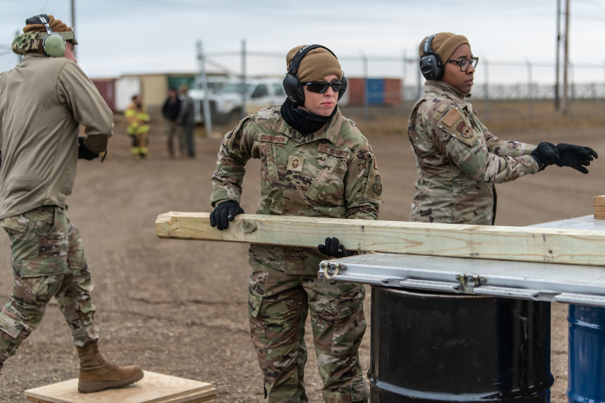 Senior Master Sgt. Sarah Thompson, a safety specialist with the Kentucky Air National Guard’s 123rd Airlift Wing, assists with a combat offload of cargo from a C-130J Super Hercules aircraft in Wainwright, Alaska, as part of Operation Arctic Haven Sept. 2, 2024. Thirty-six wing members supported the Innovative Readiness Training mission, which airlifted 39 short tons of residential building supplies to two remote villages in northern Alaska. (U.S. Air National Guard photo by Tech. Sgt. Chloe Ochs)