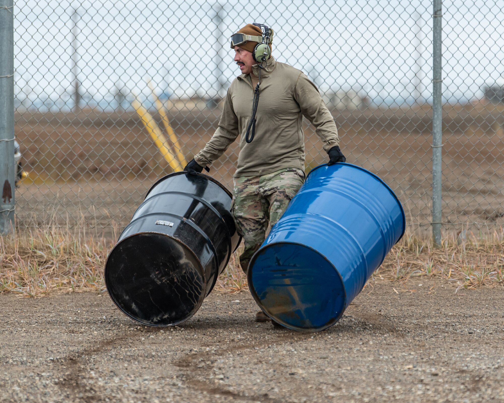 Tech. Sgt. Joseph Mendoza, an aerial port specialist with the Kentucky Air National Guard’s 123rd Airlift Wing, assists in a combat offload of cargo from a C-130J Super Hercules aircraft in Wainwright, Alaska, as part of Operation Arctic Haven Sept. 2, 2024. Thirty-six wing members supported the Innovative Readiness Training mission, which airlifted 39 short tons of residential building supplies to two remote villages in northern Alaska. (U.S. Air National Guard photo by Tech. Sgt. Chloe Ochs)