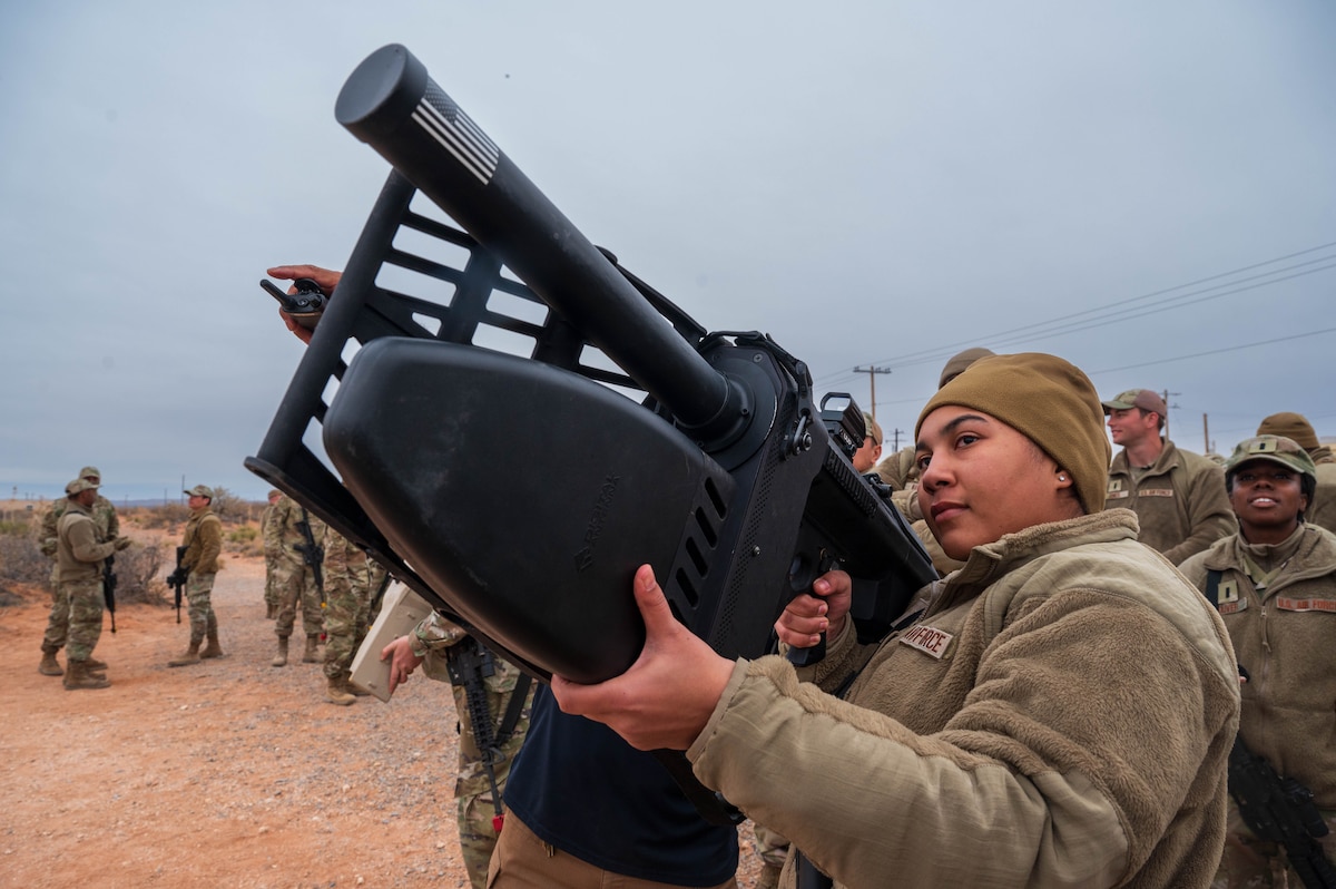 A U.S. Air Force Airman assigned to the 13th Combat Air Base Squadron utilizes a Drone Defender during counter unmanned aerial systems training during the 13th CABS first Air Task Force training event, Dec. 13, 2024, at Camp McGregor, New Mexico.