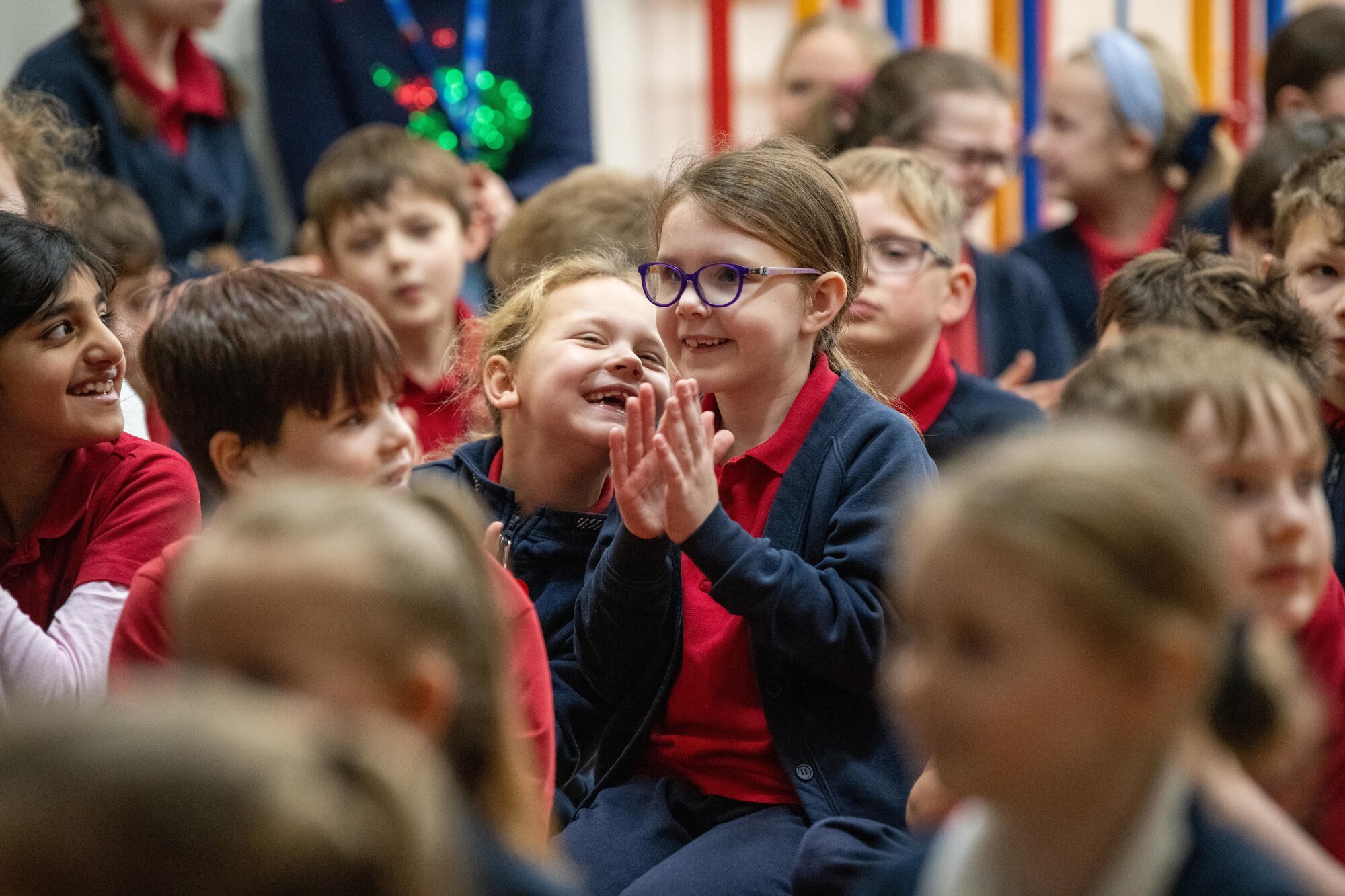 Children smile during a visit with Santa Claus