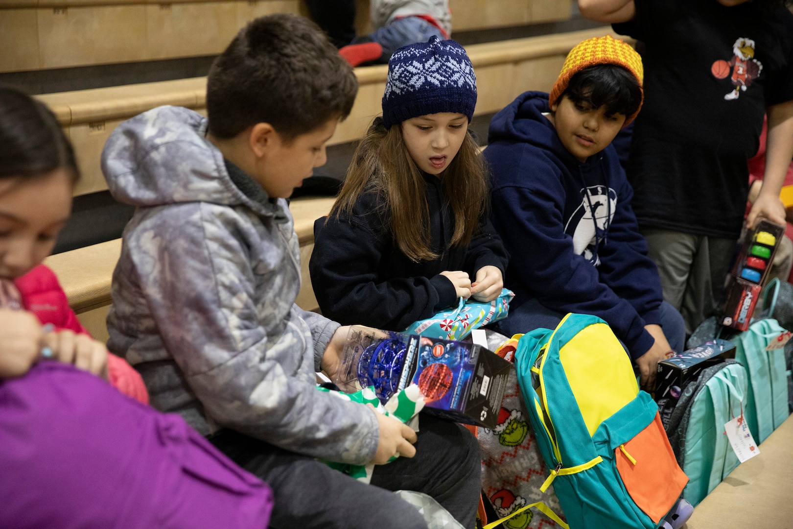 Approximately 50 Alaska National Guard service members, volunteers from the Salvation Army, AKNG Child and Youth Program and others visited the southeastern Alaskan city of Yakutat, Dec. 18, 2024.