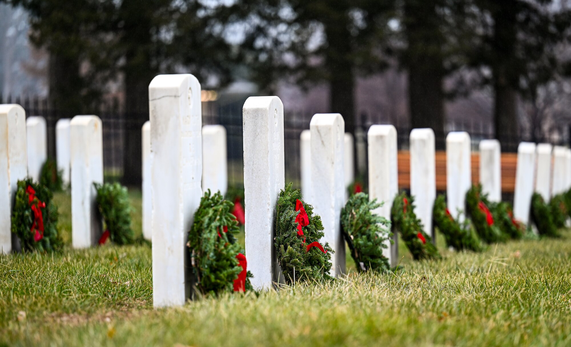 Wreaths lay on headstones
