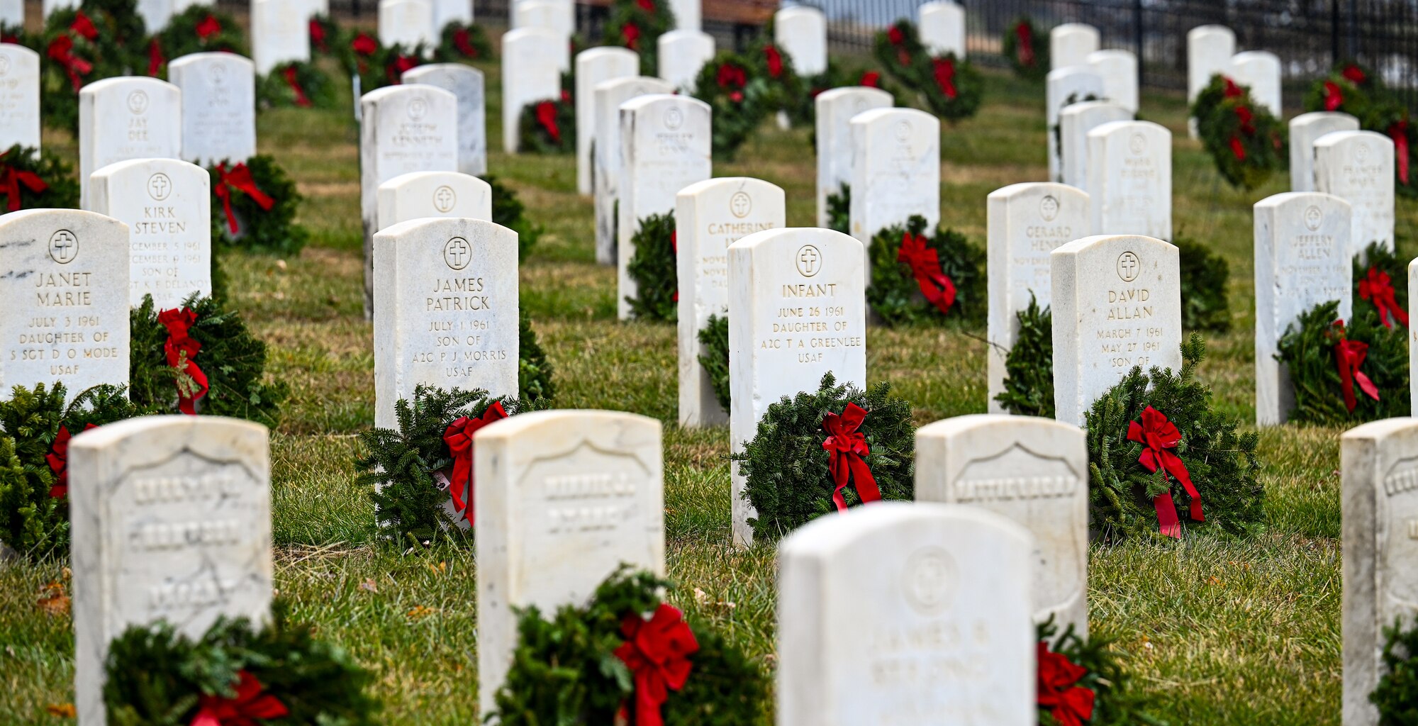 Wreaths lay on headstones
