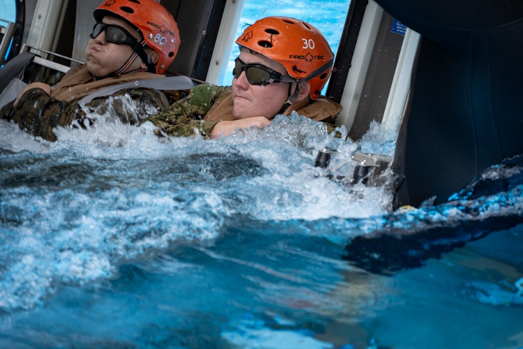 UT2 Andrew Forbes participates in "helo dunker" training in Okinawa, Japan.