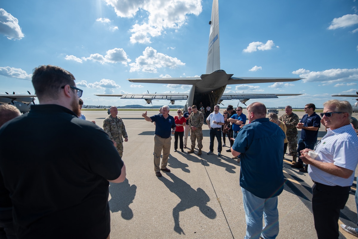 Retired U.S. Army Brig. Gen. Mike Richie, center, state chairperson for the Kentucky Committee of Employer Support of the Guard and Reserve, talks to a group of civilian employers prior to an orientation flight aboard a 123rd Airlift Wing C-130J Super Hercules aircraft at the Kentucky Air National Guard base in Louisville, Ky., Sept. 19, 2024. The flight was part of an ESGR Bosslift, a community outreach program designed to enhance understanding of the Guard mission among civilian employers. (U.S. Air National Guard photo by Phil Speck)