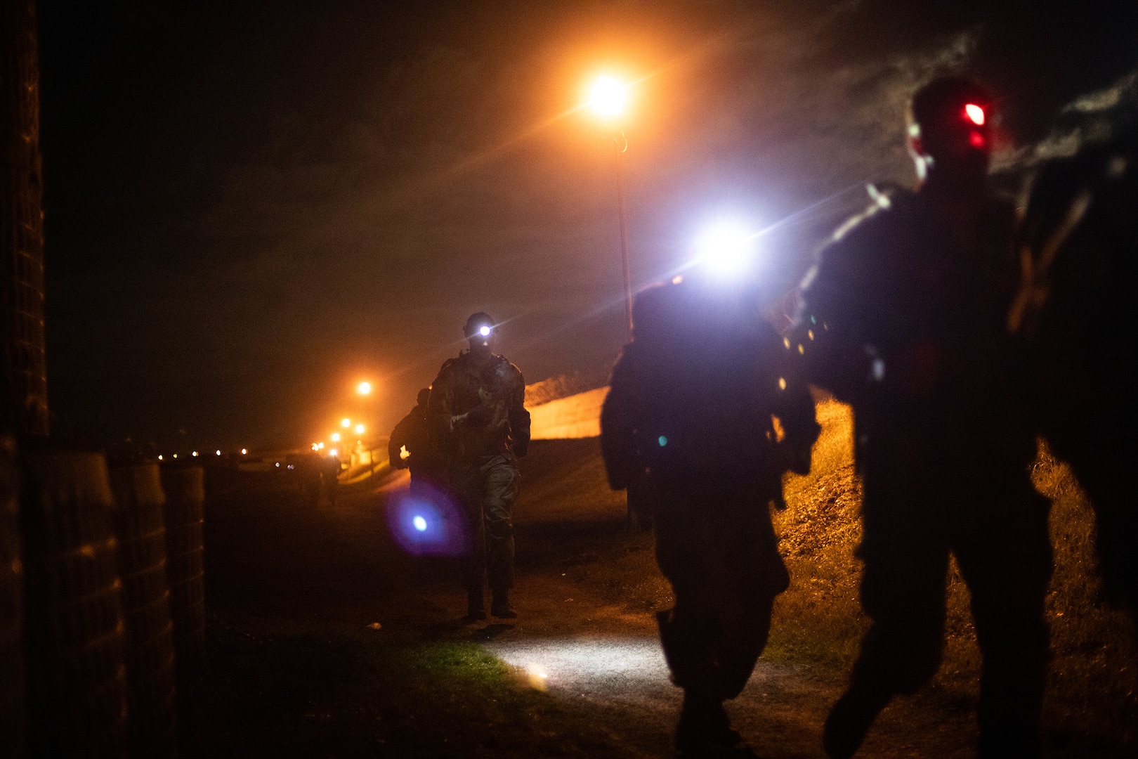 Multinational soldiers assigned to Kosovo Force 34 Regional Command-East participate in the road march portion of the German Armed Forces Proficiency Badge event held on Camp Novo Selo, Kosovo, Dec. 15, 2024.