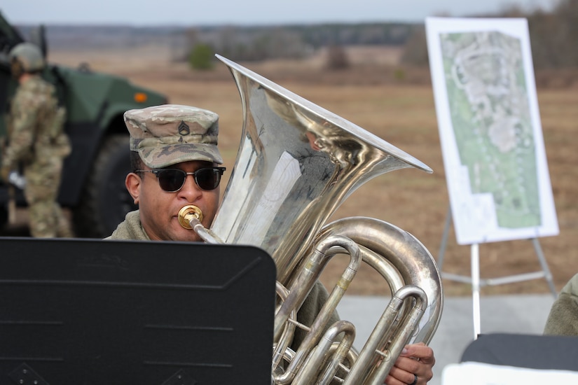 Staff Sgt. Grant Browder, 202nd Army Band, plays his tuba before the groundbreaking ceremony of the new multi-purpose machine gun range on Wendell H. Ford Regional Training Center in Greenville, Ky. Dec. 13, 2024.