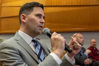 Matthew L. Sannito, U.S. Army Assistant Deputy Chief of Staff for logistics (G-4), asks a question during the Army’s Annual Audit Summit at the Mark Center in Alexandria, Virginia, Dec. 10, 2024. Sannito also took part in a panel discussion during the summit. (U.S. Army photo by Mark R. W. Orders-Woempner)