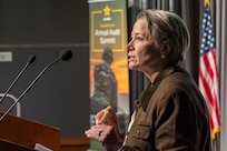 Caral E. Spangler, Assistant Secretary of the Army for Financial Management and Comptroller, delivers remarks during the Army’s Annual Audit Summit at the Mark Center in Alexandria, Virginia, Dec. 10, 2024. The two-day summit featured audit-related presentations, training sessions, technology demonstrations and audit recognitions. (U.S. Army photo by Mark R. W. Orders-Woempner)
