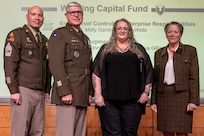 Caral E. Spangler, Assistant Secretary of the Army for Financial Management and Comptroller, along with Lt. Gen. Paul A. Chamberlain, Military Deputy to the ASA (FM&C), and Sgt. Maj. Terry L. Anderson, ASA (FM&C) senior enlisted advisor, present Molly Gamino, Office of the ASA (FM&C) Risk Management Internal Control Program manager, with a certificate of appreciation during the Army’s Annual Audit Summit at the Mark Center in Alexandria, Virginia, Dec. 10, 2024. Gamino’s and her team’s efforts helped the Army close out the Entity Level Controls – Enterprise Responsivities General Fund and Working Capital Fund material weaknesses in Fiscal Year 2024. (U.S. Army photo by Mark R. W. Orders-Woempner)