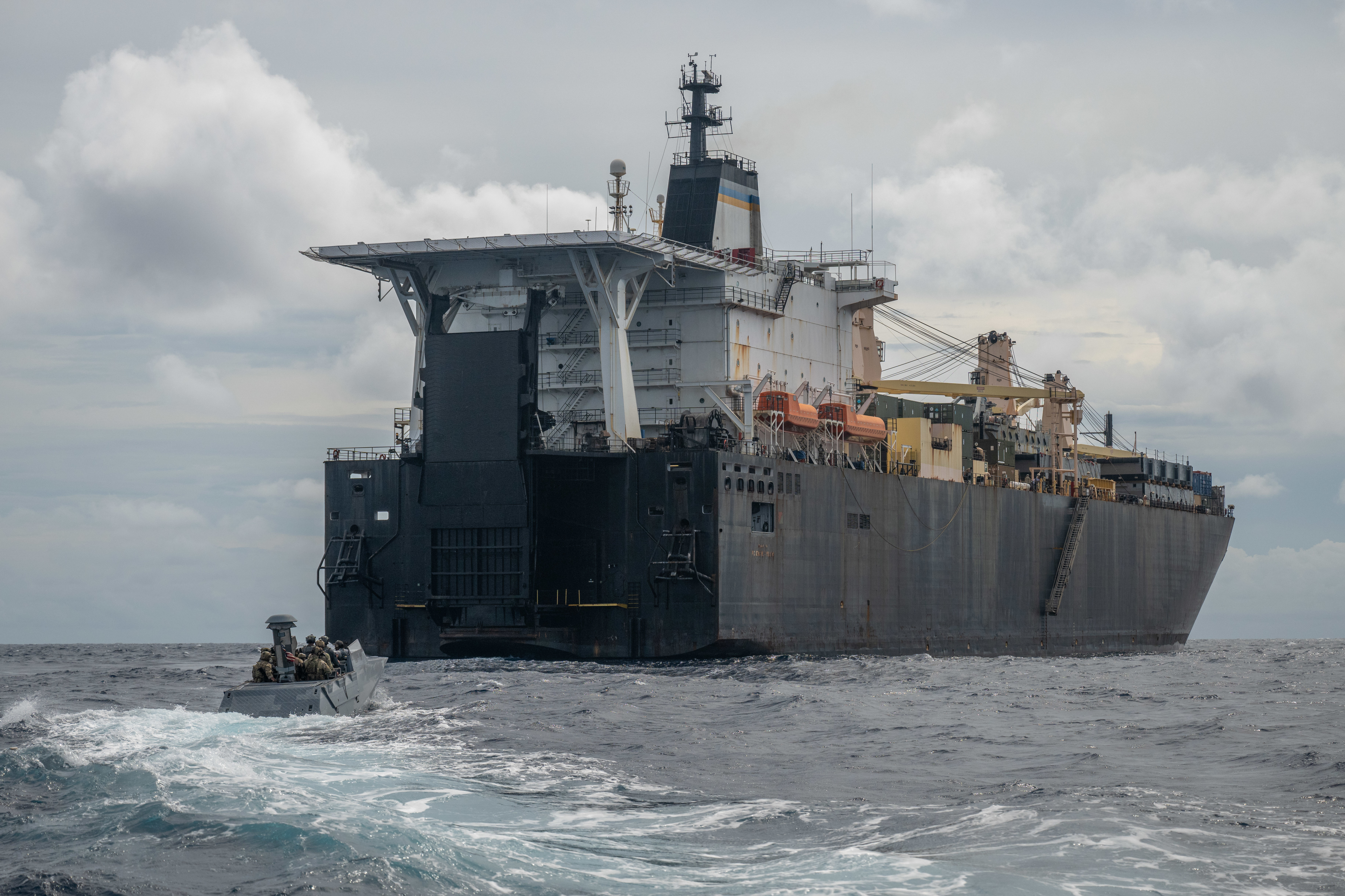 U.S. Naval Special Warfare operators and U.S. Coast Guard Maritime Security Response Team (West) members conduct visit, board, search, and seizure training aboard the 2nd Lt. John P. Bobo-class cargo ship USNS PFC Dewayne T. Williams (T-AK 3009) in the Andaman Sea, Dec. 16, 2024.