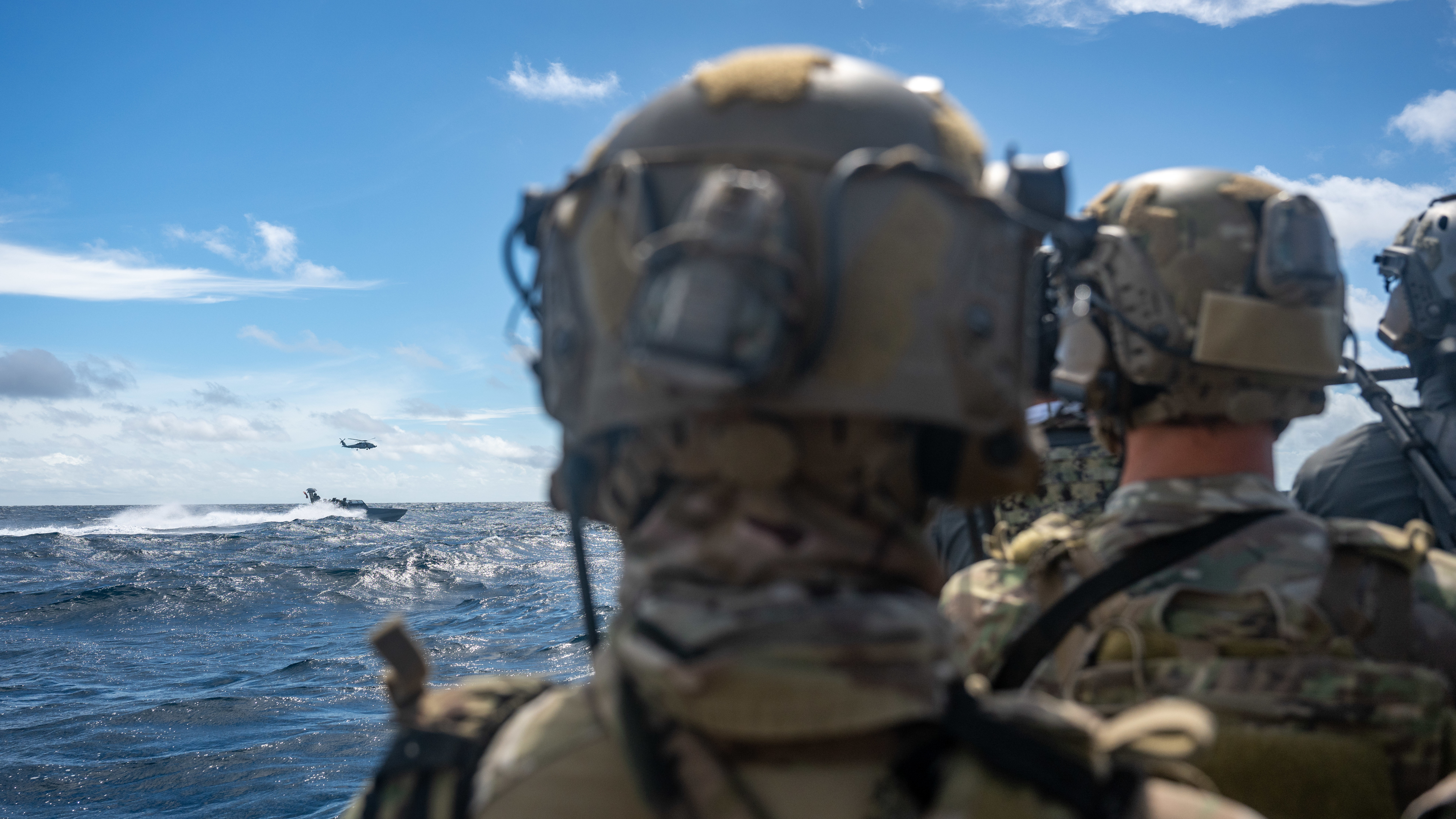 U.S. Naval Special Warfare operators and U.S. Coast Guard Maritime Security Response Team (West) members conduct visit, board, search, and seizure training aboard the 2nd Lt. John P. Bobo-class cargo ship USNS PFC Dewayne T. Williams (T-AK 3009) in the Andaman Sea, Dec. 16, 2024.