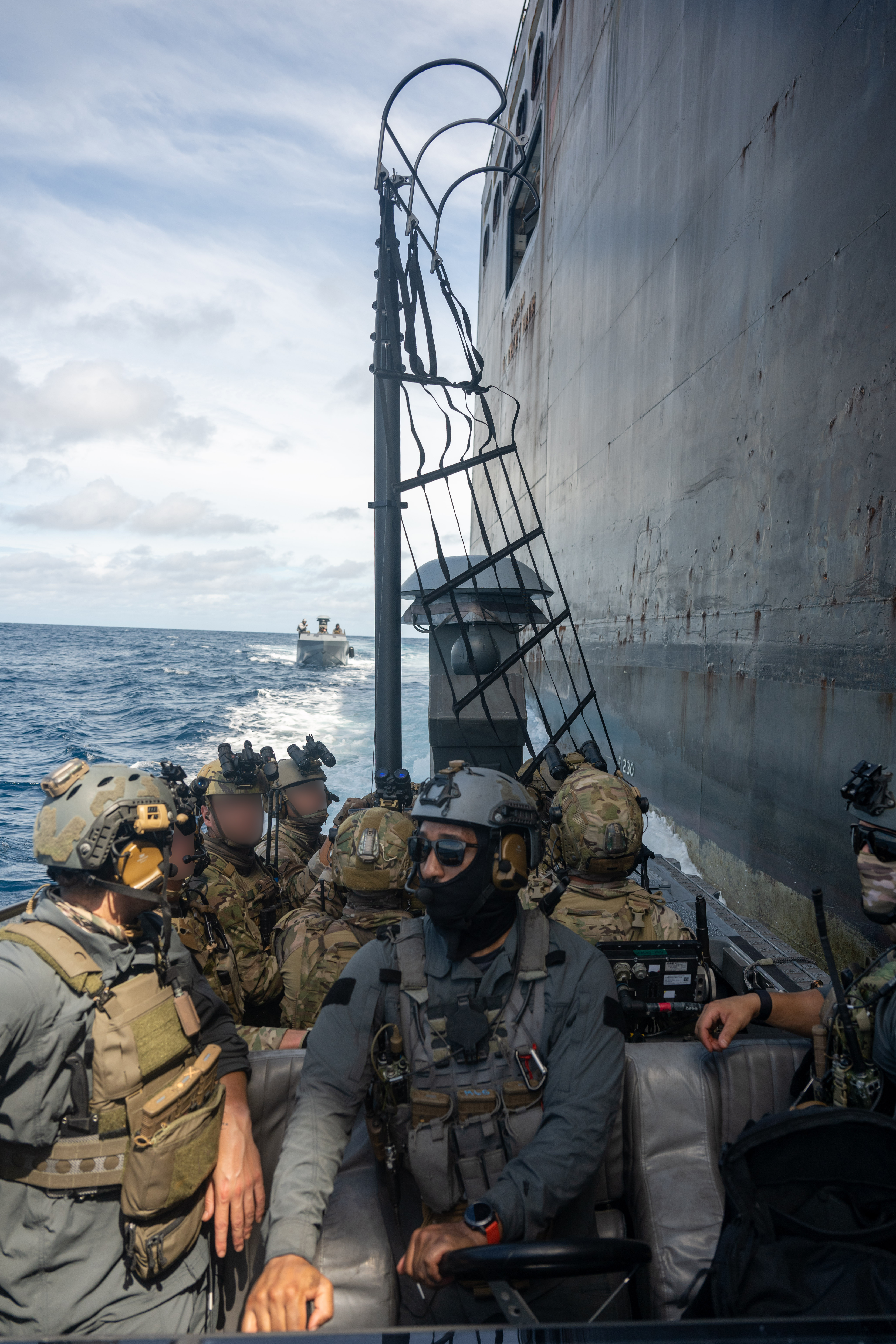 U.S. Naval Special Warfare operators and U.S. Coast Guard Maritime Security Response Team (West) members conduct visit, board, search, and seizure training aboard the 2nd Lt. John P. Bobo-class cargo ship USNS PFC Dewayne T. Williams (T-AK 3009) in the Andaman Sea, Dec. 16, 2024.