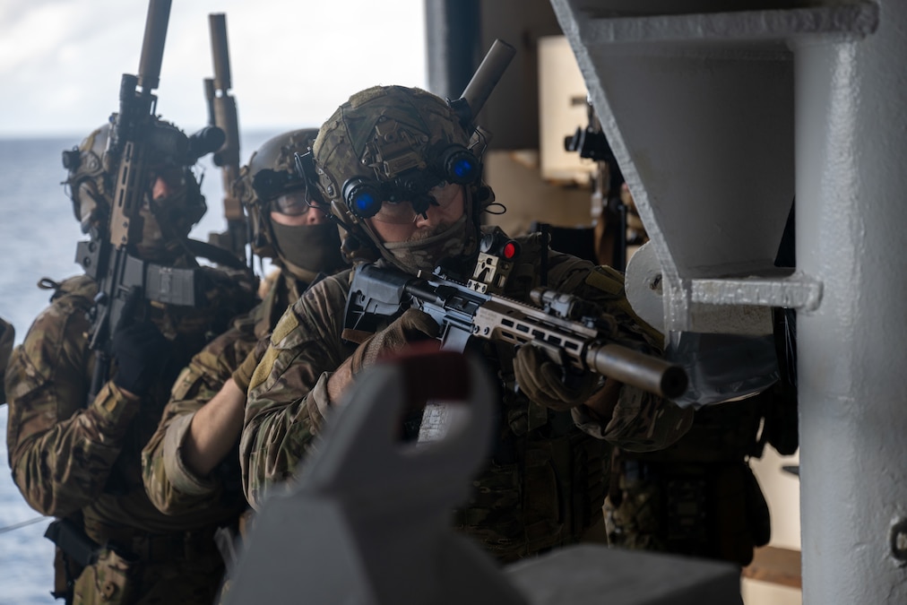 U.S. Naval Special Warfare operators and U.S. Coast Guard Maritime Security Response Team (West) members conduct visit, board, search, and seizure training aboard the 2nd Lt. John P. Bobo-class cargo ship USNS PFC Dewayne T. Williams (T-AK 3009) in the Andaman Sea, Dec. 16, 2024.
