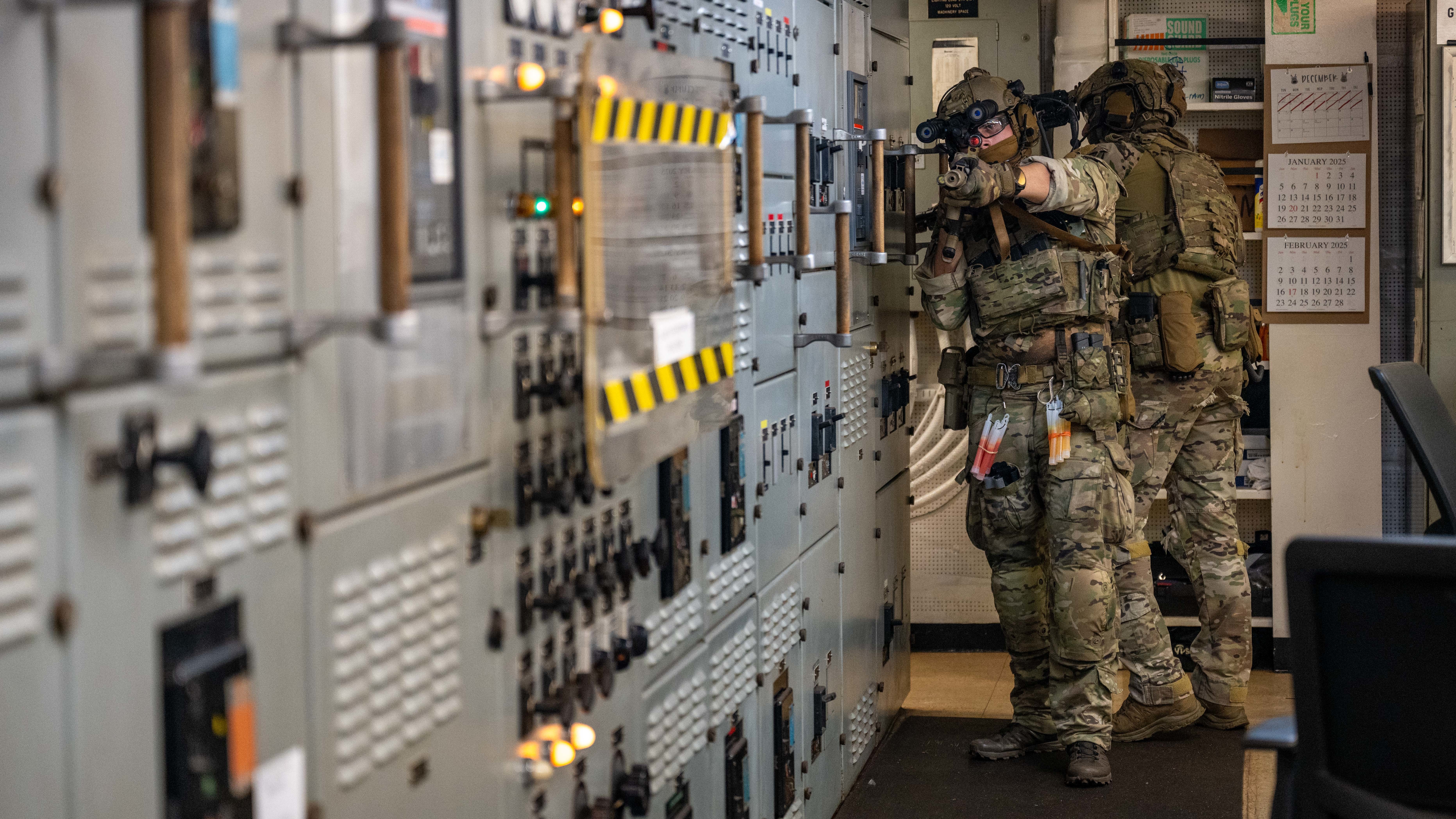 U.S. Naval Special Warfare operators and U.S. Coast Guard Maritime Security Response Team (West) members conduct visit, board, search, and seizure training aboard the 2nd Lt. John P. Bobo-class cargo ship USNS PFC Dewayne T. Williams (T-AK 3009) in the Andaman Sea, Dec. 16, 2024.
