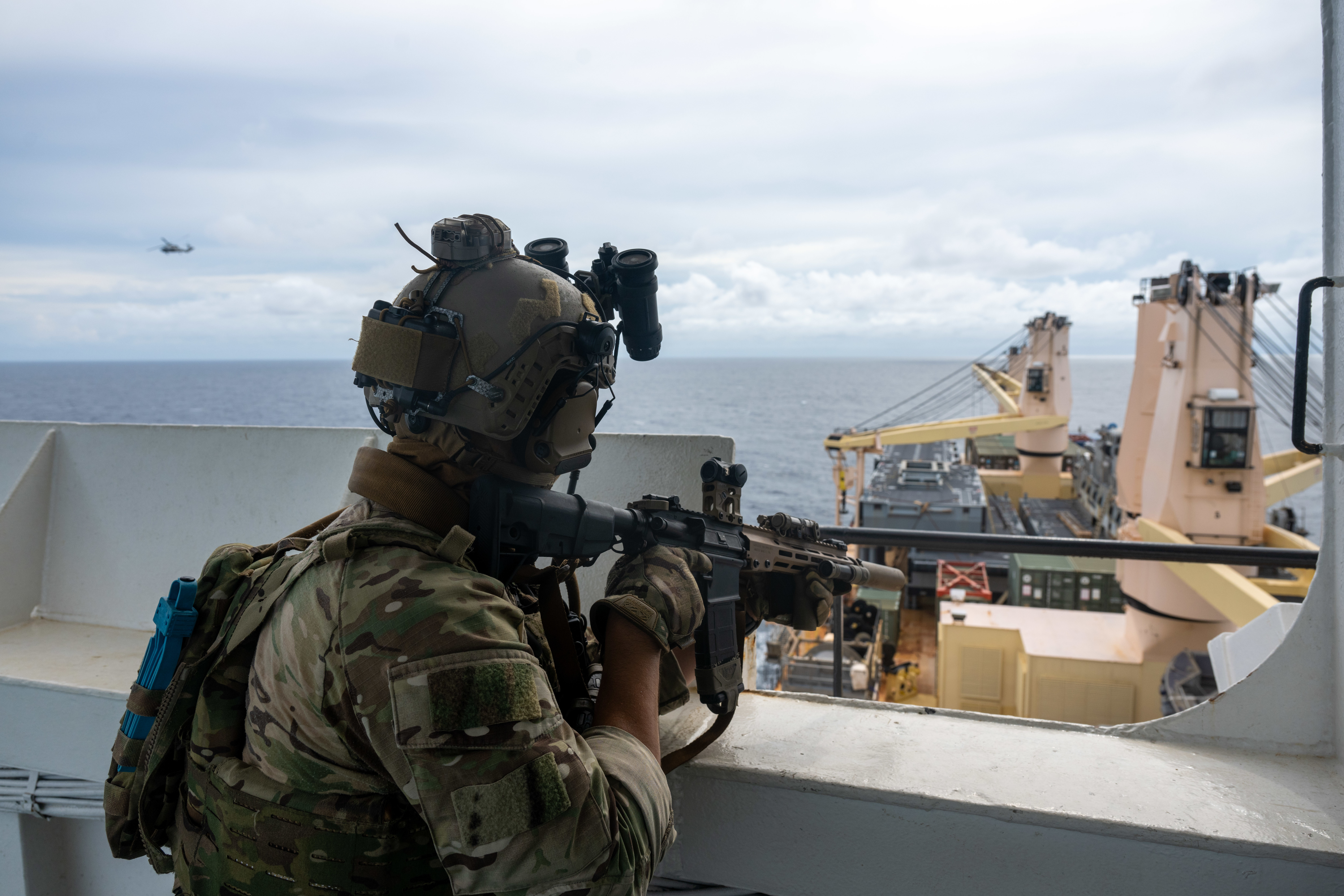 U.S. Naval Special Warfare operators and U.S. Coast Guard Maritime Security Response Team (West) members conduct visit, board, search, and seizure training aboard the 2nd Lt. John P. Bobo-class cargo ship USNS PFC Dewayne T. Williams (T-AK 3009) in the Andaman Sea, Dec. 16, 2024.