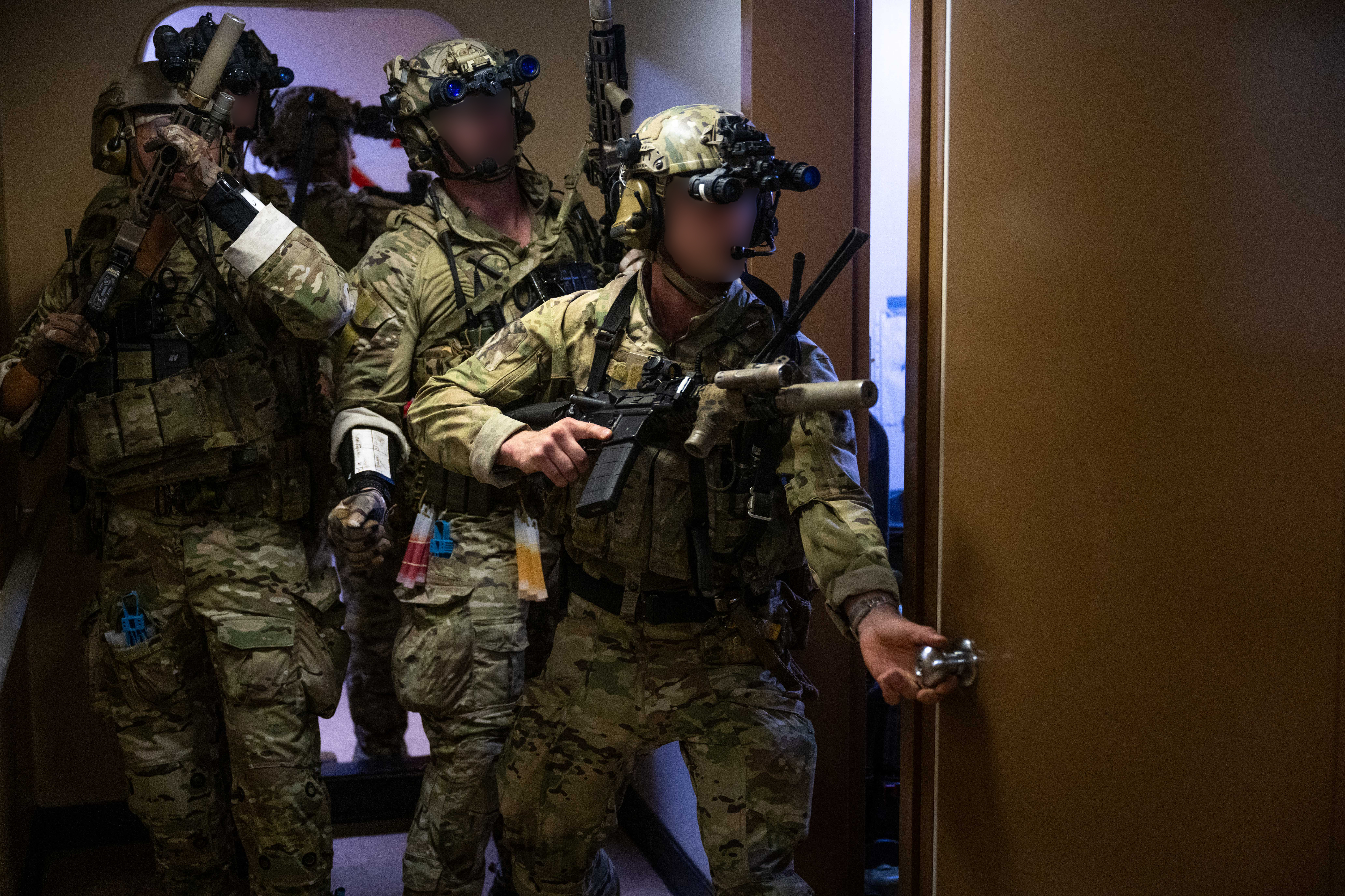 U.S. Naval Special Warfare operators and U.S. Coast Guard Maritime Security Response Team (West) members conduct visit, board, search, and seizure training aboard the 2nd Lt. John P. Bobo-class cargo ship USNS PFC Dewayne T. Williams (T-AK 3009) in the Andaman Sea, Dec. 16, 2024.