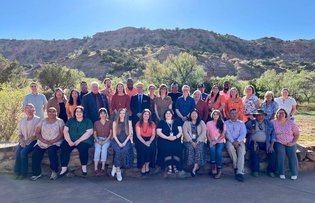 Reps from the U.S. Army Reserve's 63rd Readiness Division participate in a group photo with other attendees at the 2024 Texas Tribal Consultation Meeting. The event was co-hosted by the Texas Department of Transportation, Texas Historical Commission, and Texas Parks & Wildlife Department.