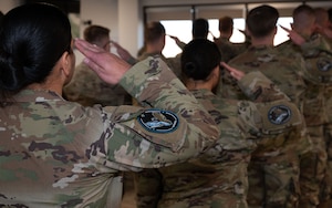 Guardians assigned to the 33rd Range Squadron render the first salute to the new commander, U.S. Space Force Lt. Col. Brandon Wilson, during an assumption of command ceremony at Schriever Space Force Base, Colorado, December 16, 2024.