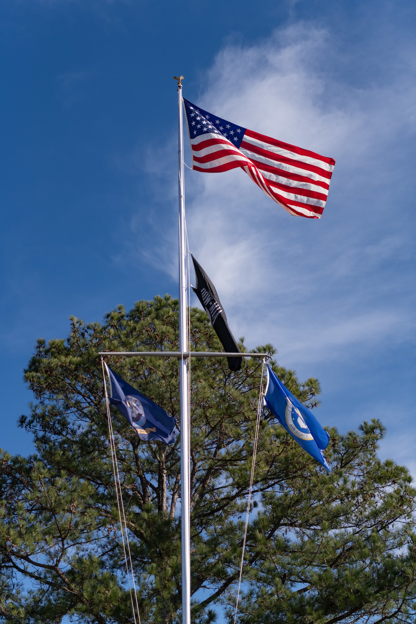 Recent upgrades were made to the flagpole located in front of the Administration and Engineering Building at Arnold Air Force Base, Tenn., headquarters of Arnold Engineering Development Complex The upgrades include a fresh coat of paint, repair of the pole’s pulley system and a new finial of an eagle that sets a top the flagpole. (U.S. Air Force photo by Keith Thornburgh)