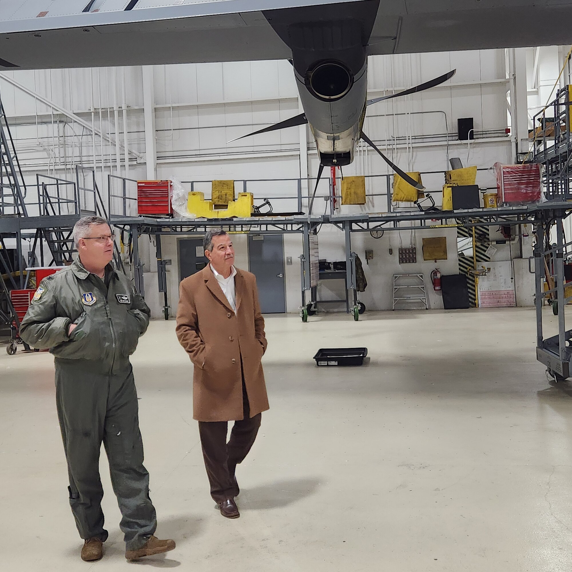 Col. Mike Maloney, 910th Airlift Wing commander, escorts a member of Region II of the Association of Ohio Commodores as they view the unit’s new C-130J-30 Super Hercules aircraft at Youngstown Air Reserve Station, Ohio, Dec. 12, 2024.