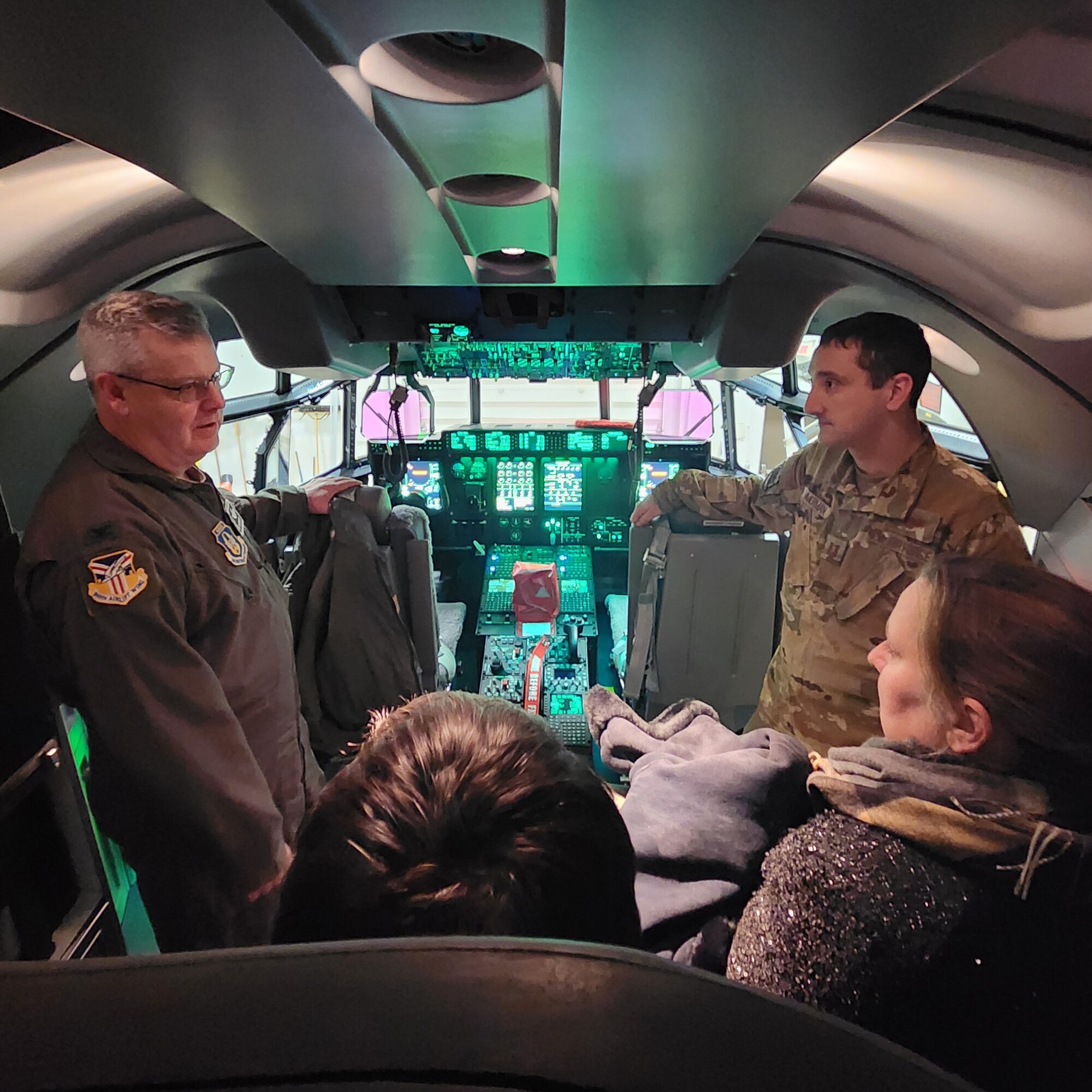 Col. Mike Maloney, 910th Airlift Wing commander, talks with members of Region II of the Association of Ohio Commodores on the flight deck of the 910th AW’s new C-130J-30 Super Hercules aircraft at Youngstown Air Reserve Station, Ohio, Dec. 12, 2024.