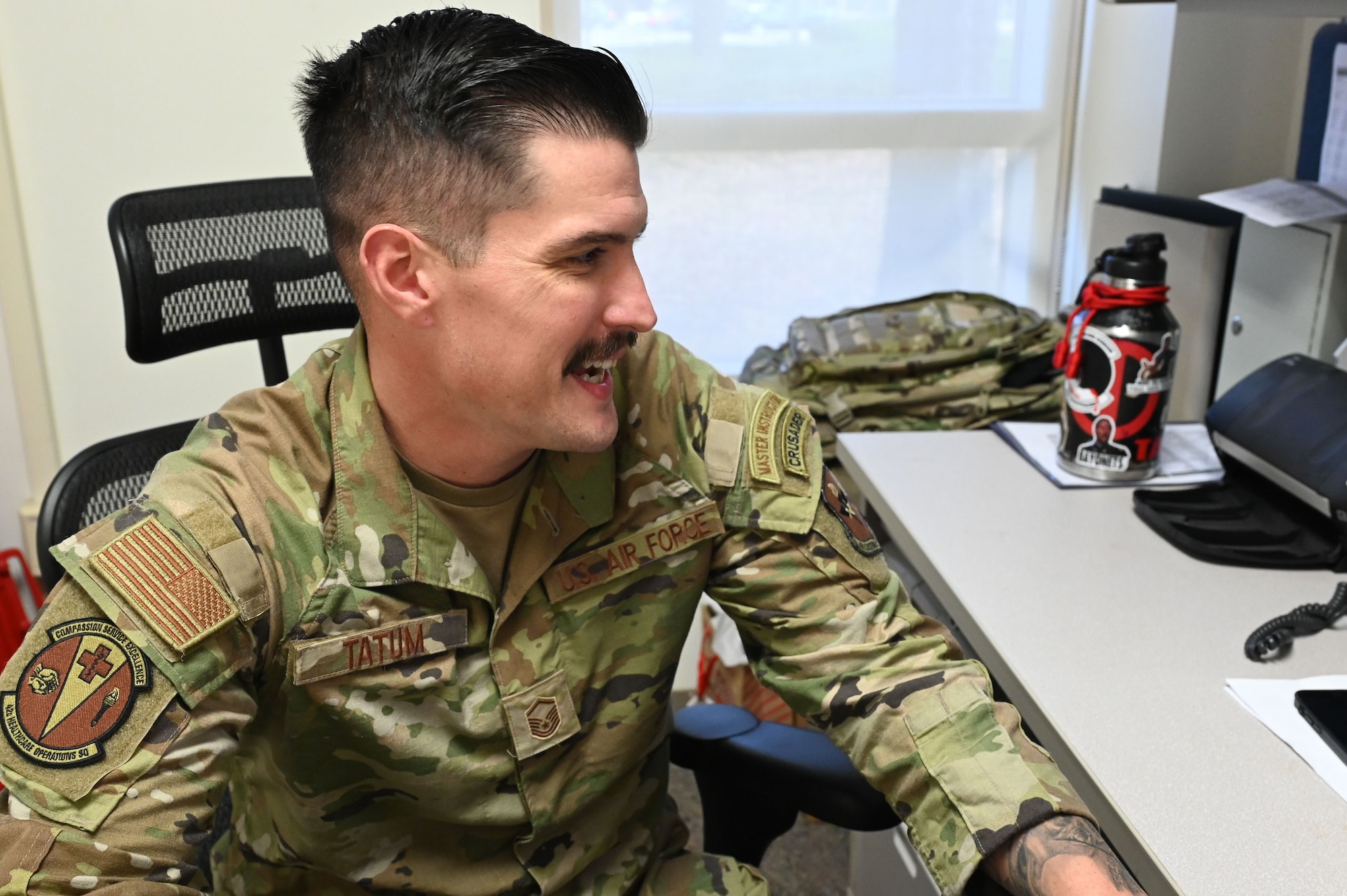 U.S. Air Force Master Sgt. Robert Tatum, 42nd Medical Group pharmacy flight chief, checks his email in his office at Maxwell Pharmacy Dec. 16, 2024. T